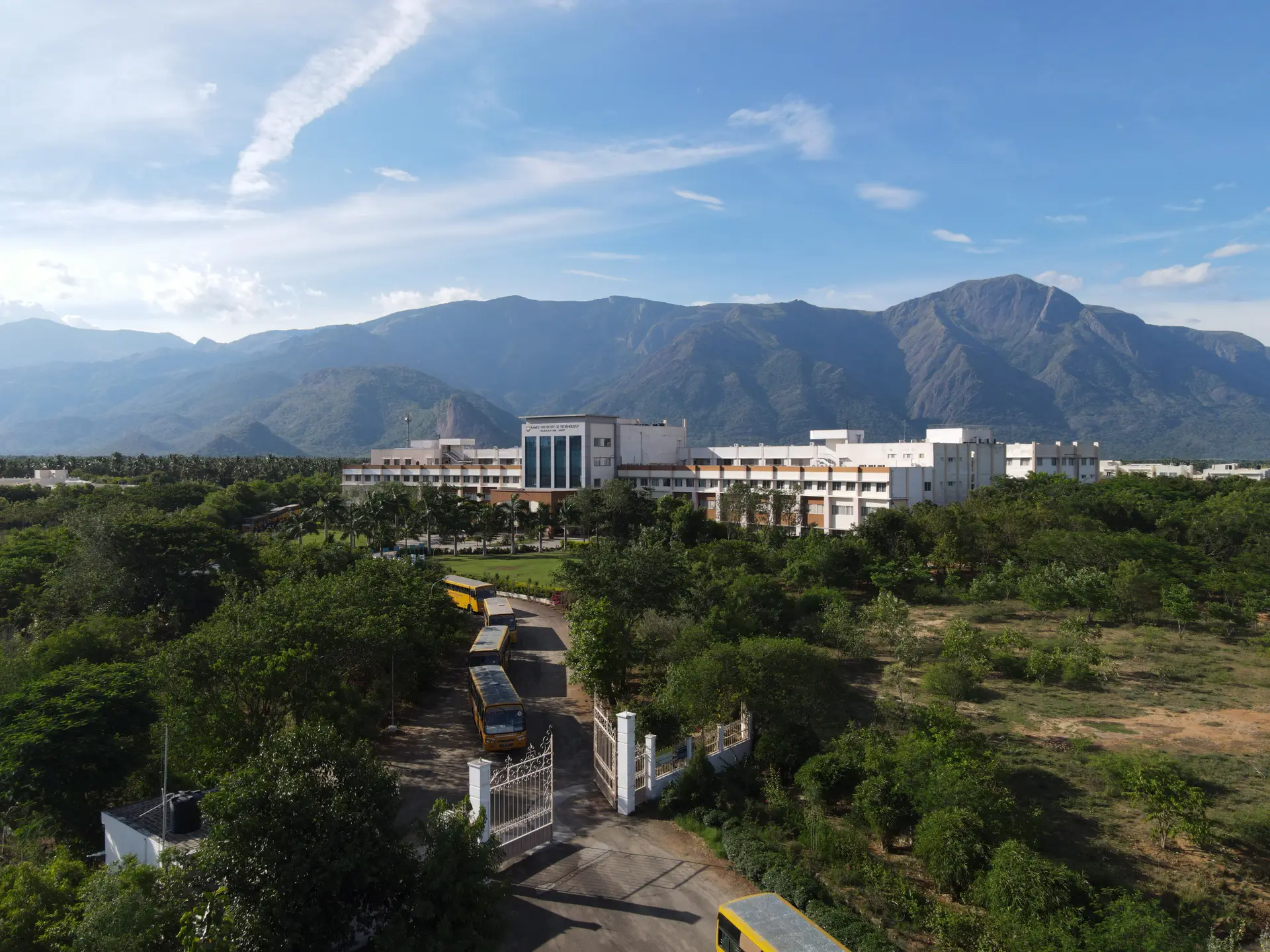 Aerial view of the campus with mountains behind